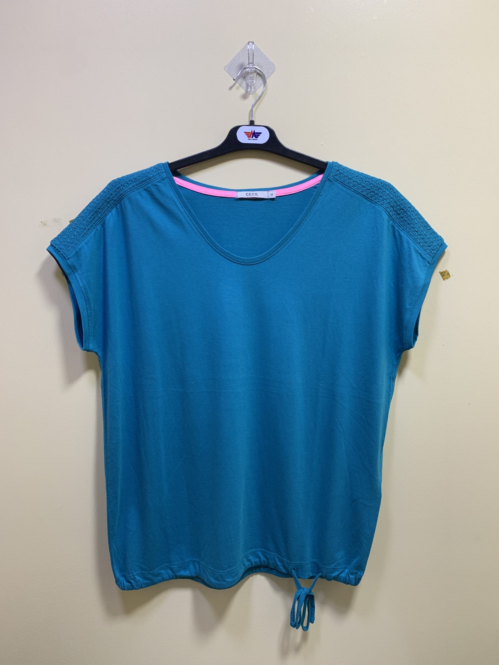 Apparel Tech Pack: 12 Essential Checks for Better Production 9 Blue short-sleeve crew-neck T-shirt